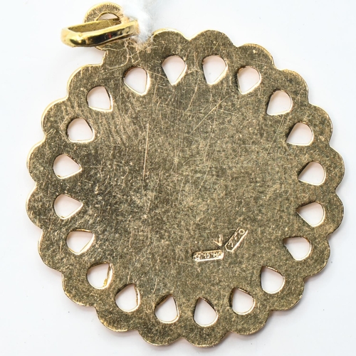 23 - Circular UAE pendant, the yellow metal pendant with Italian marks and 750, length including bale 32m... 