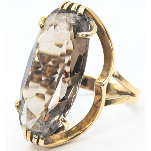 35 - 9ct gold and smokey quartz open work design cocktail ring, hallmarked London 1972, size L, gross wei... 