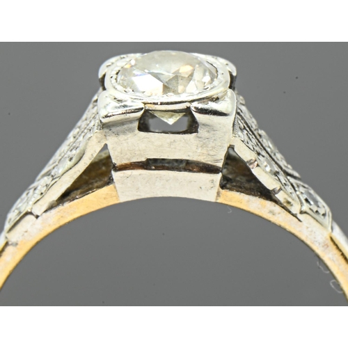 39 - Art Deco yellow metal and diamond ring, centring a round transition-cut diamond weighing approximate... 