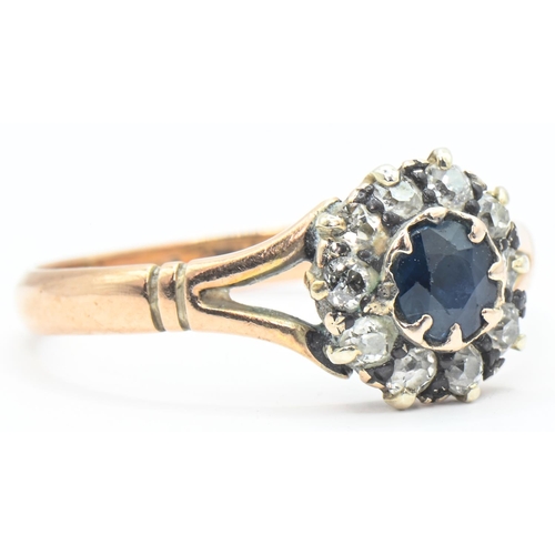 44 - Yellow metal, sapphire and diamond cluster ring, marked 9CT, tested as 9ct gold, size N1/2, gross we... 