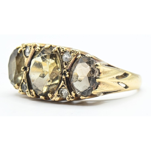 46 - 9ct gold, three stone citrine and white stone accented ring, hallmarked, size O, gross weight 4.17 g... 