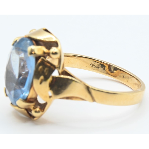 47 - Yellow metal and blue topaz ring, marked 585, tested as 14ct gold, size Q, gross weight 6 grams... 