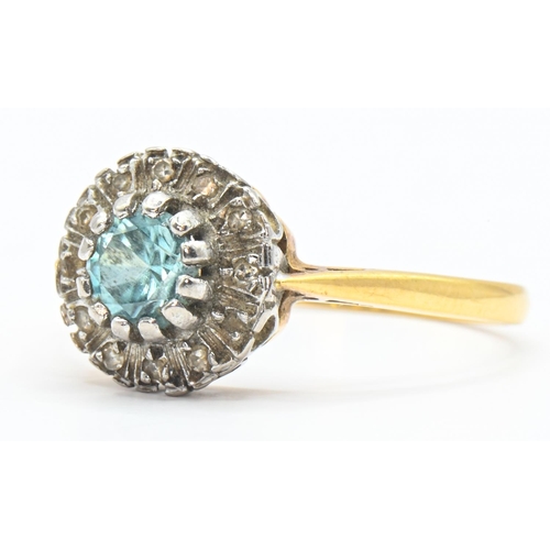 67 - Gold, blue topaz and diamond cluster ring, rubbed hallmark, tested as 18ct gold, size S, gross weigh... 