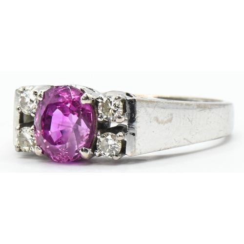 70 - Pink sapphire and diamond ring, the white metal shank stamped 'WM 18K', tested as 18ct gold, size N,... 