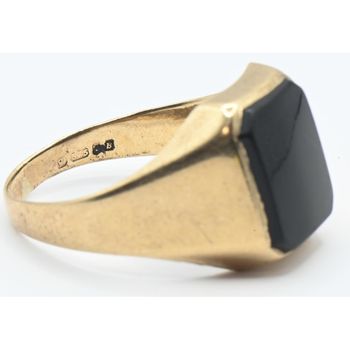 71 - 9ct gold and onyx signet ring, hallmarked, size approximately Q, gross weight 3.79 grams