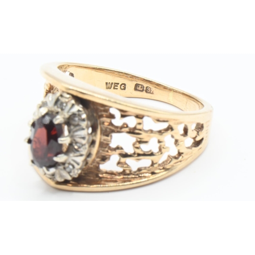 74 - 9ct gold, garnet and diamond cluster ring, partial hallmark, size K1/2, gross weight 4.5 grams... 