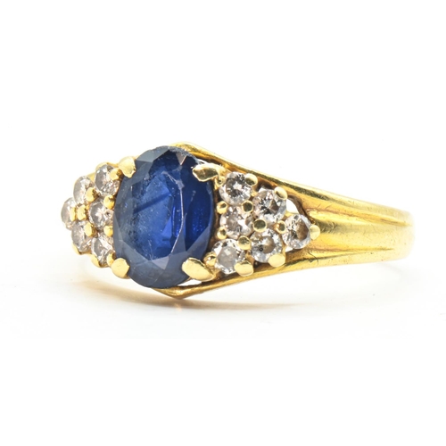 83 - Sapphire and diamond ring, the yellow metal shank stamped 750, tested as 18ct gold, size N, gross we... 