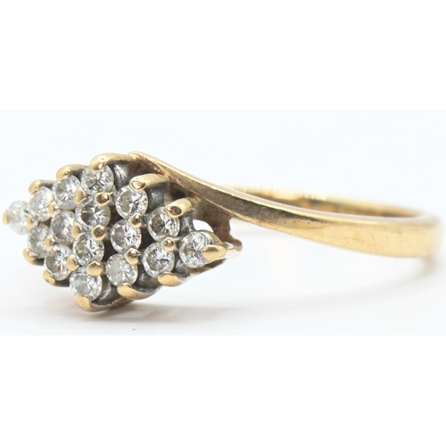 85 - 9ct gold and diamond lozenge-shaped cluster ring, hallmarked, size M, gross weight 1.95 grams... 