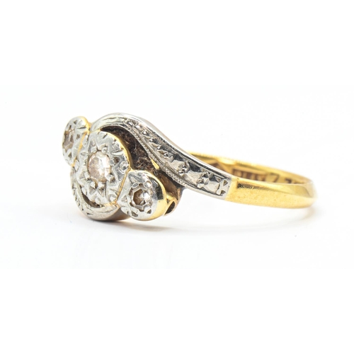 97 - Diamond three stone crossover ring, set to a polished band stamped 18CT PLAT and with maker's mark H... 