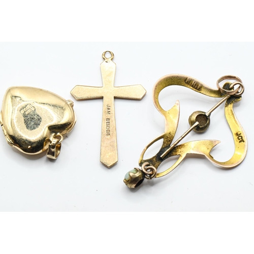 110 - Three pendants, comprising: 9ct gold Birmingham hallmarked heart-shaped locket and cross pendant; an... 