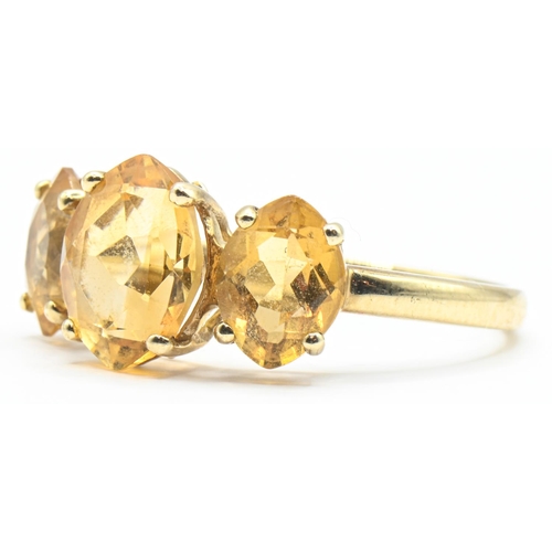 153 - 9ct gold and three stone citrine ring, hallmarked, size Q1/2, gross weight 2.4 grams