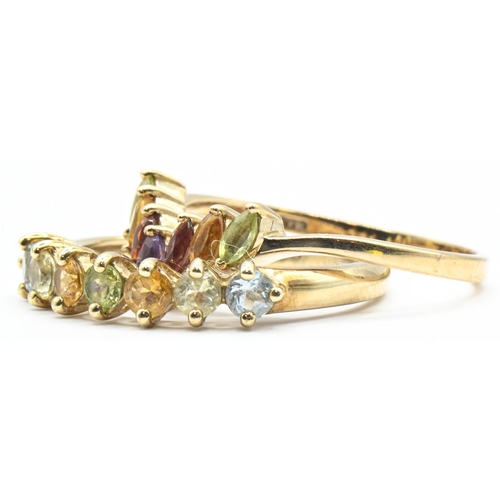 155 - Two multi-gem rings, comprising one hallmarked for 9ct gold, size Q1/2; and a wishbone ring sta... 