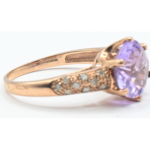 160 - 9ct rose gold, amethyst and diamond ring, hallmarked, size Q1/2, gross weight 3.14 grams