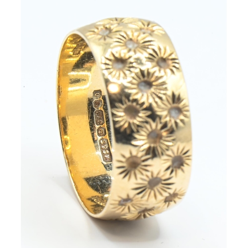 169 - 9ct gold ring, the wide band with a continuous floral pattern, hallmarked London 1978, size R, 5.2 g... 