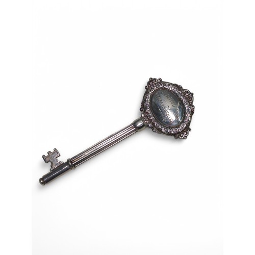 196 - George VI silver presentation key, Mappin & Webb Ltd, Birmingham 1937, the head engraved over ea... 