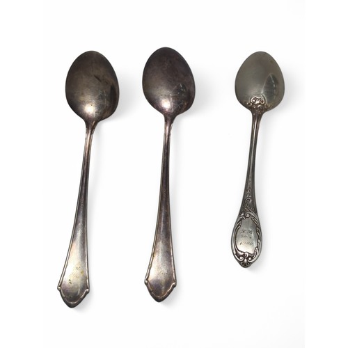 209 - Three German 800-grade silver spoons, including a pair of serving spoons with maker's mark Bremer Si... 