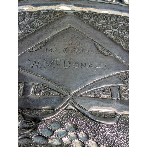 202 - Indian white metal embossed presentation tray, inscribed 'Mr. & Mrs. W.McDonald Presented By Cha... 