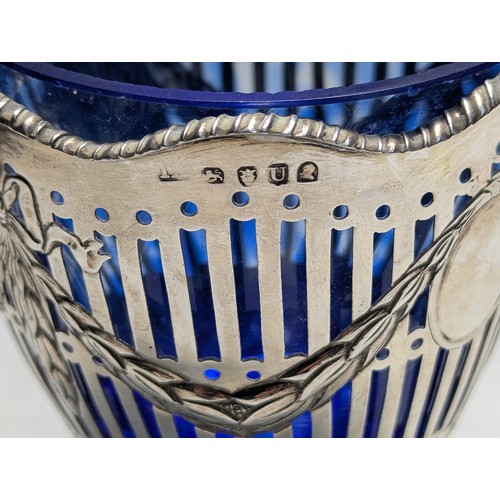 204 - George III silver pierced sugar basket, maker's mark rubbed, London 1815, with foliate swags and car... 