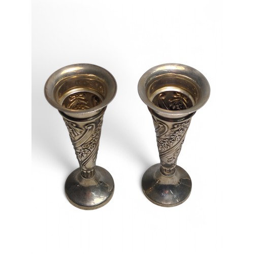 205 - Pair of silver posy vases, rubbed Walker & Hall hallmark, of tapered form with embossed floral a... 