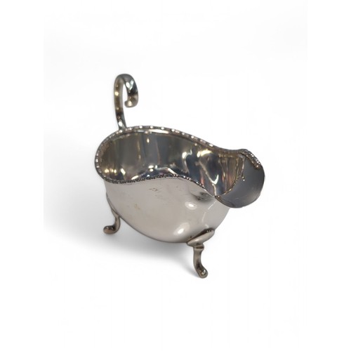 208 - George V silver sauce boat, Walker & Hall, Birmingham 1932, of small proportion with gadroo... 