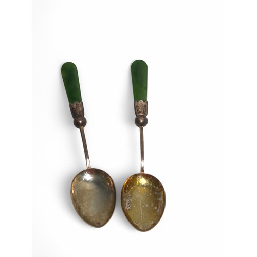 200 - Seven silver teaspoons, comprising: two with green stone handles, HM, Birmingham 1910; and a part se... 