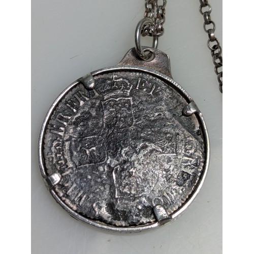 229 - William III shilling in pendant mount with chain, mount inscribed 'Treasure from Association 1707', ... 