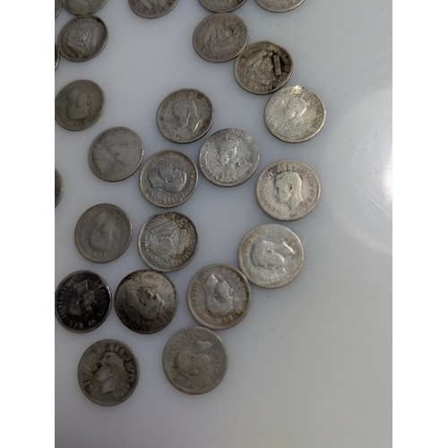 246 - Collection of South African silver coins, including 63.1 grams of pre-1950 threepences (800-gra... 