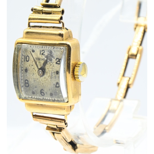 273 - 18ct gold cased Texa Watch ladies watch with a 9ct gold sprung bracelet strap, the dial with Arabic ... 