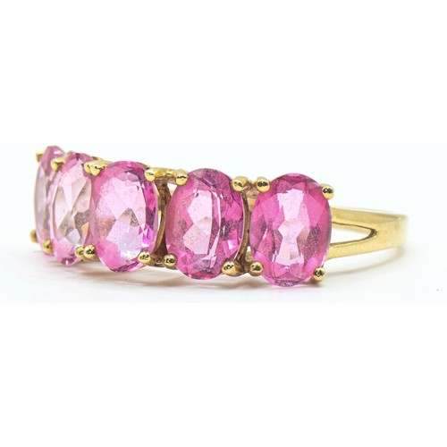 100 - 9ct gold and five stone pink gemstone ring, hallmarked, size Q, gross weight 2.63 grams