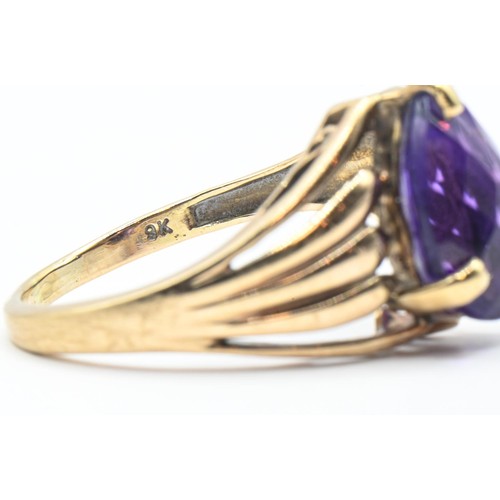 54 - 9ct gold and pear-shaped amethyst ring, hallmarked, size Q1/2, gross weight 3.45 grams