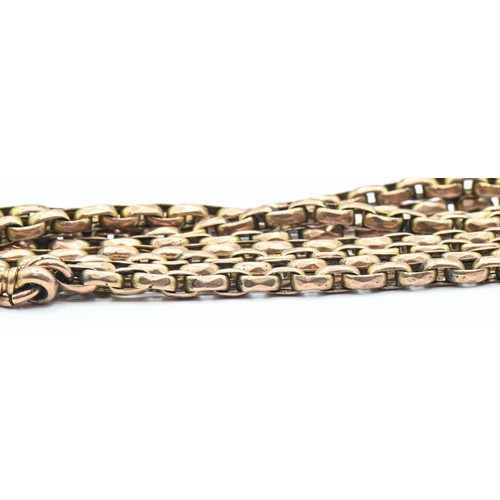 59 - Rose coloured yellow metal doubled watch chain, with oval belcher links and a clasp, clasp marked 'A... 