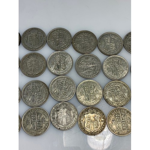 245 - Twenty-four pre-1947 half crowns, gross weight 335 grams