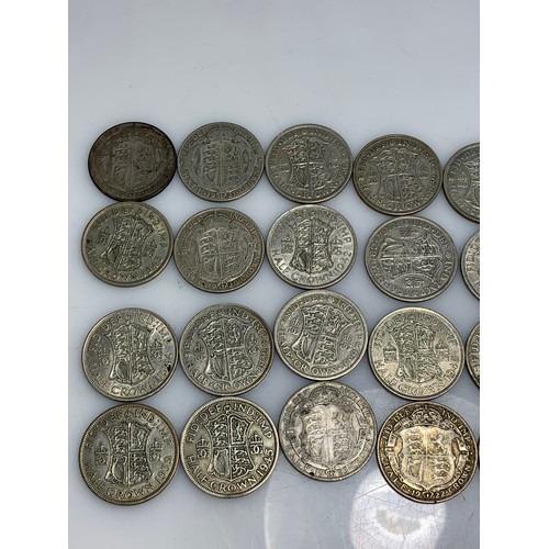 245 - Twenty-four pre-1947 half crowns, gross weight 335 grams