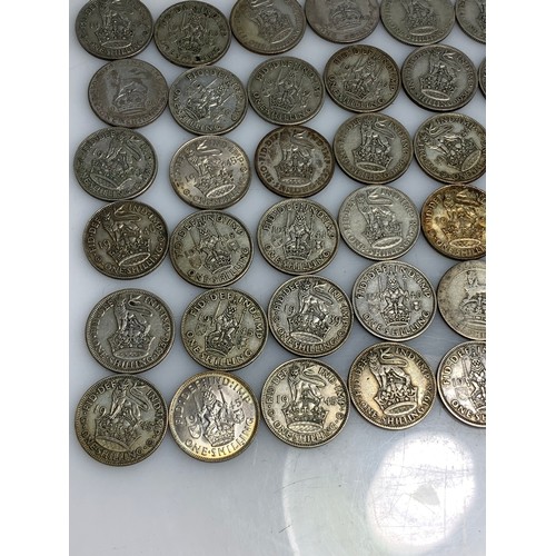 248 - 225 grams of pre-1947 one shillings