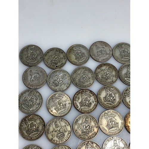 248 - 225 grams of pre-1947 one shillings