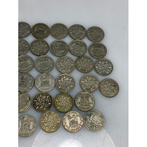 249 - 160 grams of pre-1947 sixpences