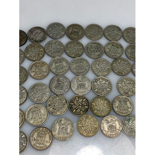 249 - 160 grams of pre-1947 sixpences