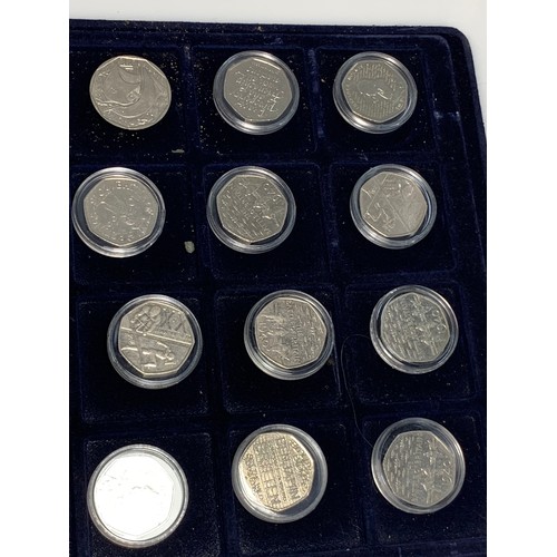 256 - Twenty-three collectable 50 pence coins