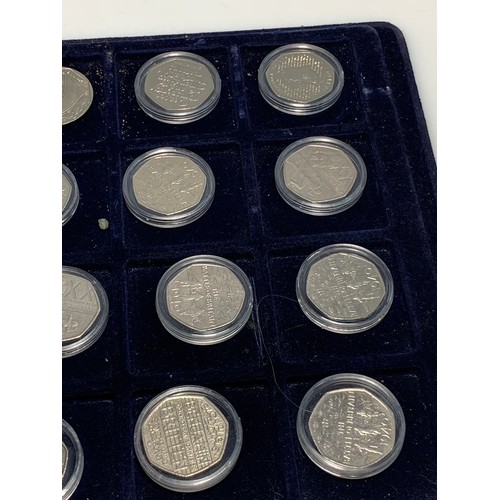 256 - Twenty-three collectable 50 pence coins