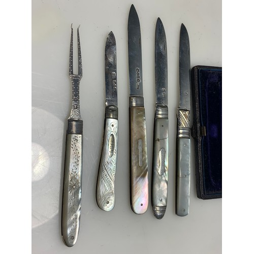 295 - Four silver and mother-of-pearl fruit knives and a fork, including Georgian and Victorian, some with... 