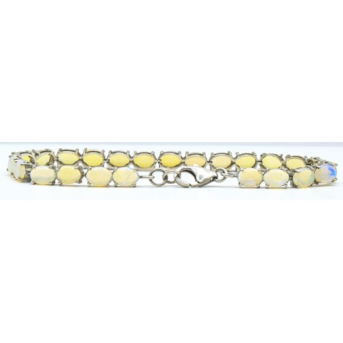 177 - 925 silver and opal line bracelet, length 200mm, gross weight 8.8 grams