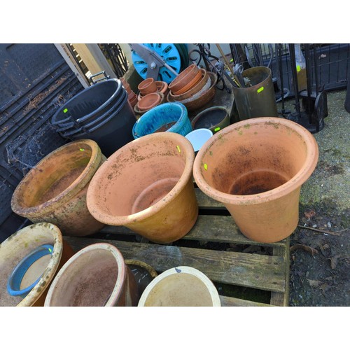 126 - Three large terracotta plant pots inc. two 'Yorkshire Flower Pots', in largest dia. 44 x ht. 32cm... 