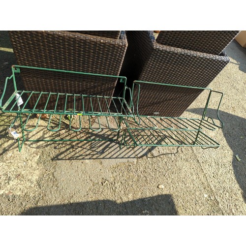 249 - A pair of Rattan Style Arm Chairs with round glass topped table