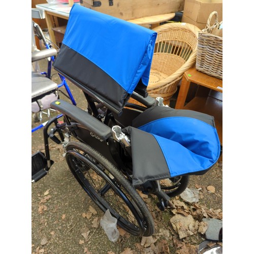 389 - G-Logic folding wheelchair. 