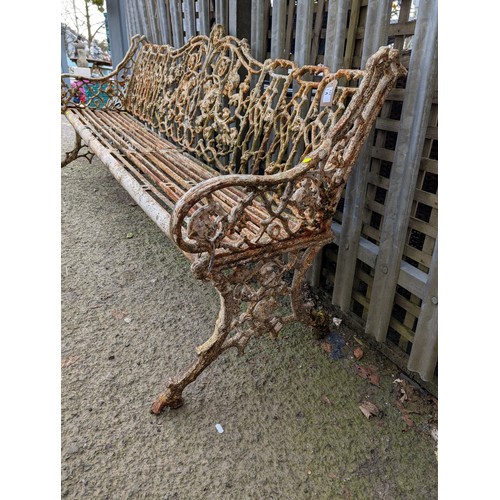 1A - Ornate cast iron garden bench. W186cm D61cm H83cm.