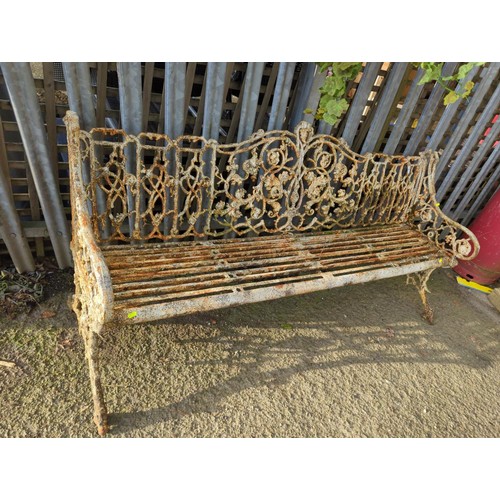 1A - Ornate cast iron garden bench. W186cm D61cm H83cm.