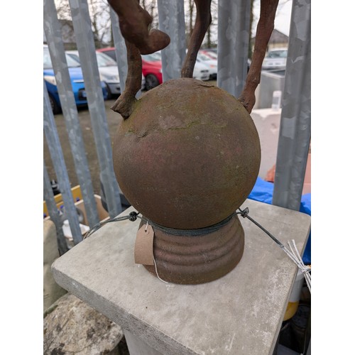 3 - Pair of cast iron stags on sphere bases, dia. 22cm x ht. 89cm approx.