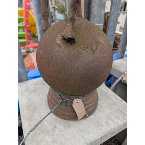 3 - Pair of cast iron stags on sphere bases, dia. 22cm x ht. 89cm approx.