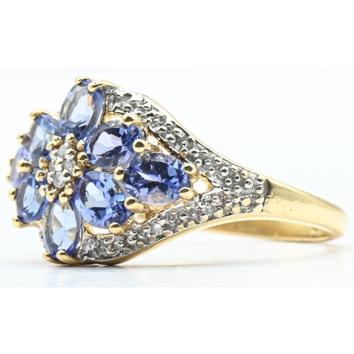 29 - 14ct gold, tanzanite and diamond flowerhead cluster ring, hallmarked, size M1/2, gross weight 2.85 g... 