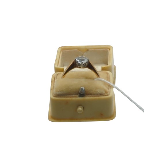 21 - Yellow metal and white stone solitaire ring, size P1/2, gross weight 2.79 grams